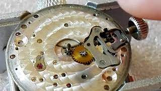 Loose cannon pinion in watch movement. Loose crown in time setting.