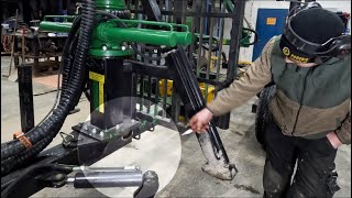 Fixing a broken piston bracket to the frame steering on a forestry trailer part 1.