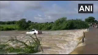 Watch: Car washed away in strong water current in Andhra Pradesh