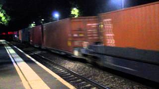 Freightliner shed 66526 speeds past with an intermodal