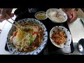 a simple restaurant surrounded by nature run by a gentle old woman.