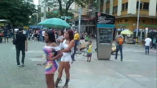 Women Lined up in el centro Medellin in Bunches