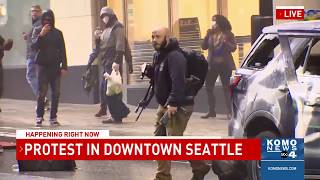 Security guard secures rifle stolen by protester in downtown Seattle