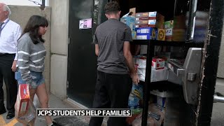 Group of JCPS students, staff helping families in need as part of community outreach project