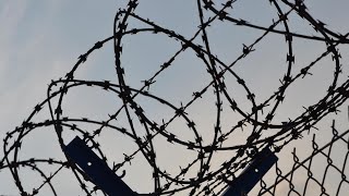 Georgia prisons cutting jobs, moving staff 'behind the wire'