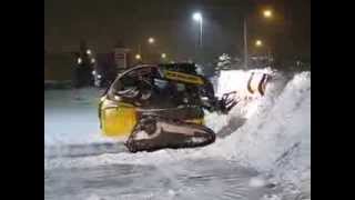 Snowplowing in Waterloo Ontario Canada with 2014 New Holland C232  CTL \u0026 9' Plow Snowman.ca