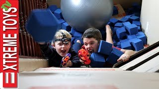 Box Fort Nerf Battle! Ethan Vs. Cole Nerf Attack in a Crazy Huge Cardboard Box Base