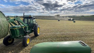 John Deere Tractors Making Hay