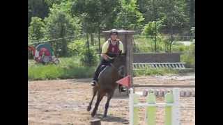 Krissy running the Intro jump course at Stonegate Farms