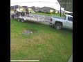 Guy on Can-Am atv bends tailgate after bad trailer loading