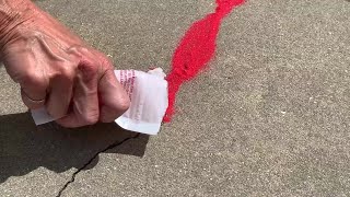 Local leaders spread red sand outside Hillsborough County courthouse for human trafficking victims