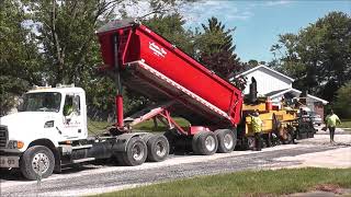 Paving An Asphalt Road | Caterpillar Paver