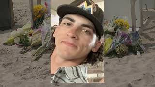 Hundreds gather for candlelight vigil honoring lifeguard killed by lightning