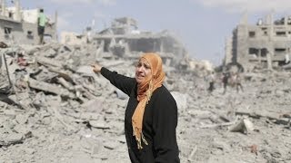 During cease-fire, Gaza residents survey destruction