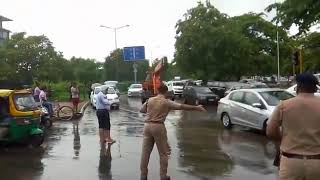 SSP (Traffic) Shashank Anand regulates traffic  during rain in Chandigarh on Monday.