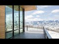 modern mountain home around a courtyard red hawk house