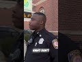 police officer de escalates tense situation