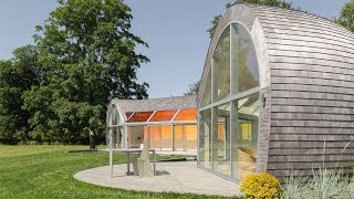 Skylights create rainbow patterns inside cedar-covered Cocoon House by Nina Edwards Anker