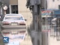 Still stranded in flood-hit Japan