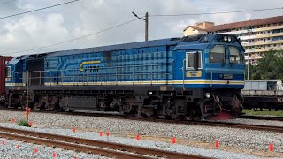 KTMB Class 29103 Merbau locomotive with a large fleet of container wagons arriving from North Port.