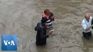 Residents Wade Through Floodwaters in India  | VOA News