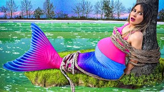 The mermaid is 9-months pregnant and she's having the baby in the abandoned pool
