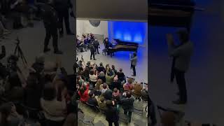 Police interrupting piano play by Alexey Lubimov