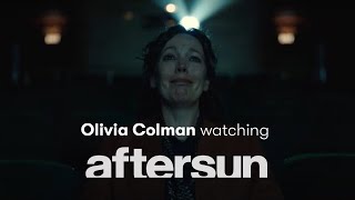 Olivia Colman watching the "Under Pressure" scene in Aftersun