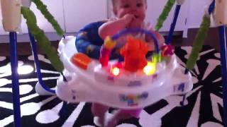 Tasha Luna baby bouncing in jumperoo