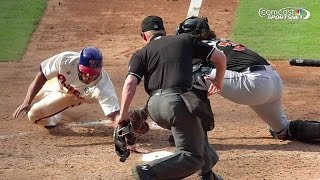 MIA@PHI: Revere slides in safely ahead of the tag