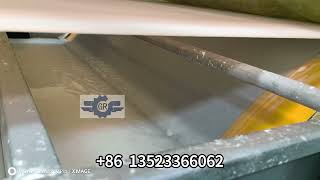The circular net forming section of the paper machine is in operation.