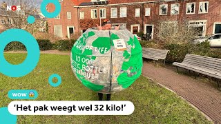 Deze hardloper rent een halve marathon verkleed als wereldbol