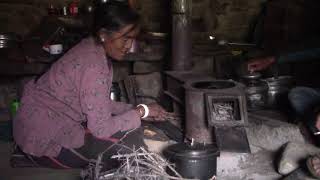 Himalayan Woman making Fire