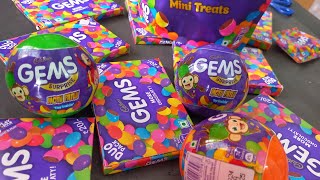 100 candies opening, chocolate a video, lots of chocolates, Cadbury celebration, surprise toys