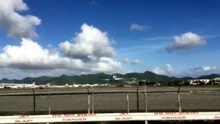 Small Plane landing in Saint Marteen in Slow Mo HD