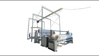 Maxi roll slitting and rewinding machine