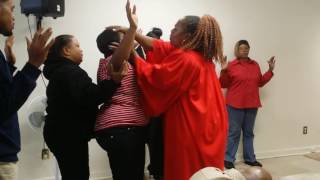 PASTOR MCLANE LAY HANDS ON THE PEOPLE