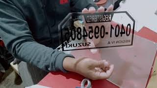 How to apply vinyl sticker to a acrylic motorcycle plate