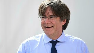 Catalan ex-leader Puigdemont says returning to Belgium before attending October hearing in Italy