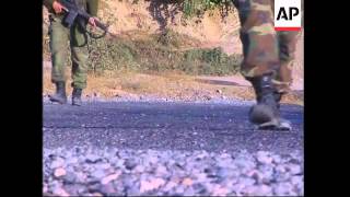 Turkish troops patrolling border area with Iraq, looking for mines