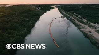 DOJ threatens to sue Texas over floating barrier in Rio Grande