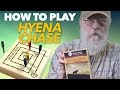 Play Hyena Chase, a strategic board game from Sudan for two to four players.