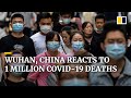 China’s Wuhan moves on as global coronavirus death toll passes 1 million