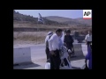 roadblock separates bride and groom