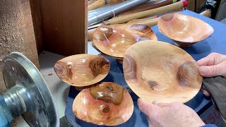 Richard Raffan oiling and finishing some of his Wavy Bowls