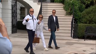 Biden departs from White House sporting a Team USA jacket