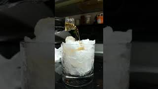 Pouring Liquor Over Ice