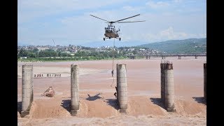 Jammu: IAF chopper rescues 2 fishermen stuck in the flooded Tawi