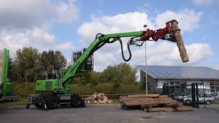 Sennebogen 718E Tree Handler with Vosch saw grapple.