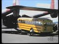 loading a wien tour bus aboard a c82 flying boxcar at fairbanks